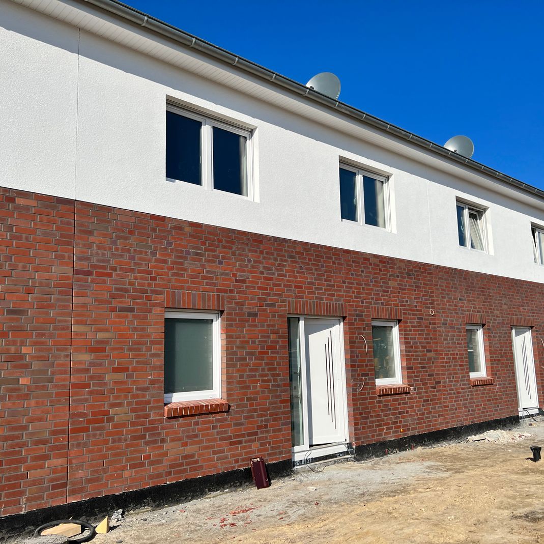 Mehrfamilienhaus - gebaut mit Root Hausbau - Neubau und Sanierung im Heidekreis und Umgebung Hamburg, Hannover und Bremen