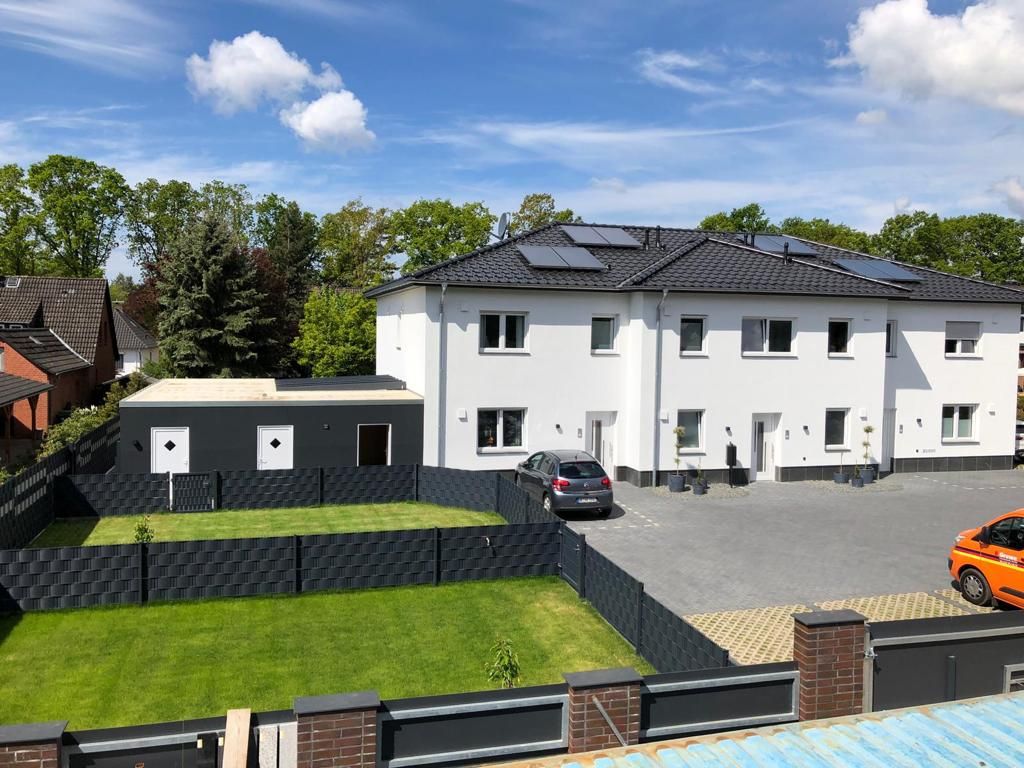 Mehrfamilienhaus - gebaut mit Root Hausbau - Neubau und Sanierung im Heidekreis und Umgebung Hamburg, Hannover und Bremen