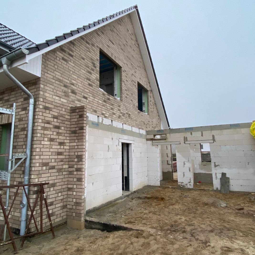 Einfamilienhaus- gebaut mit Root Hausbau - Neubau und Sanierung im Heidekreis und Umgebung Hamburg, Hannover und Bremen