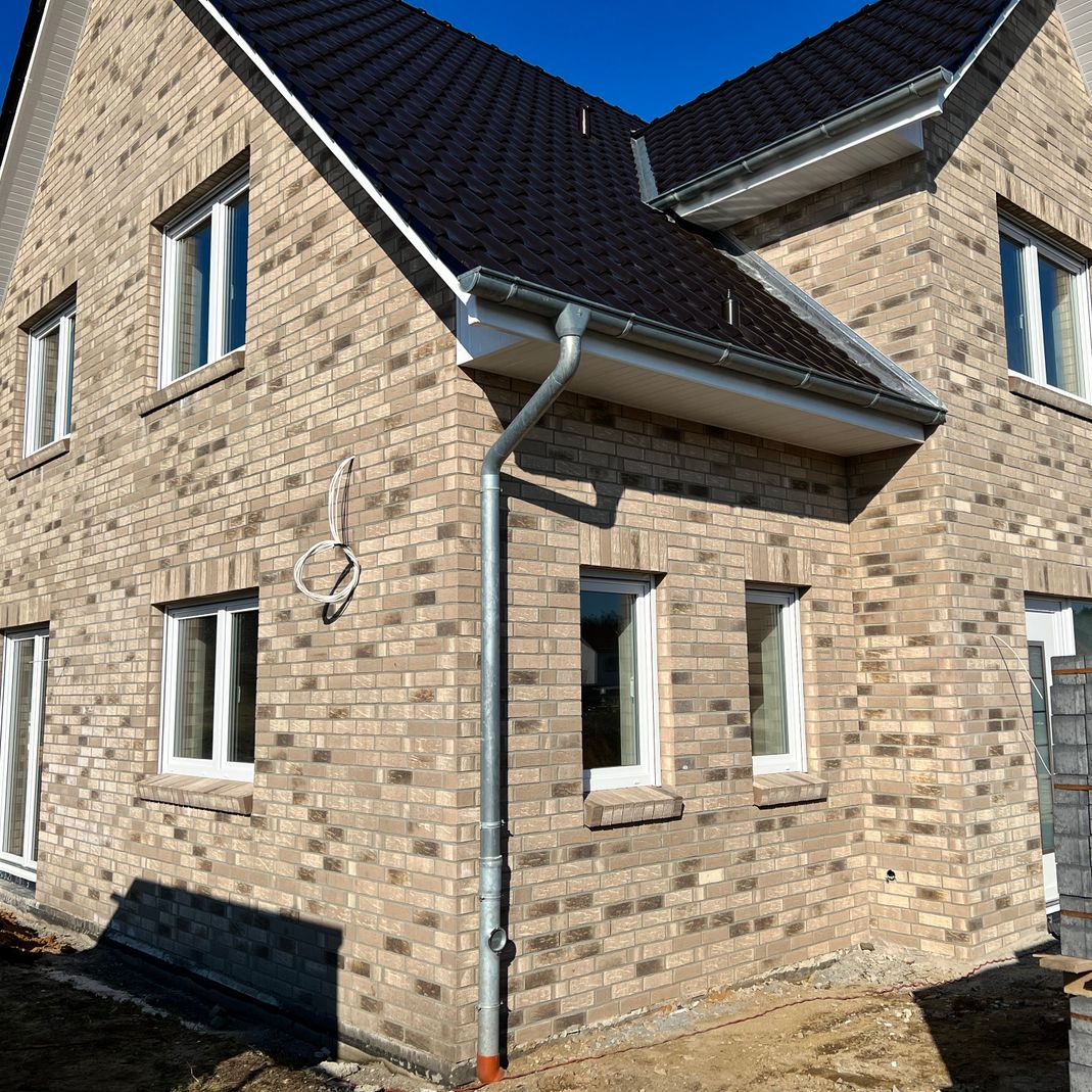 Einfamilienhaus- gebaut mit Root Hausbau - Neubau und Sanierung im Heidekreis und Umgebung Hamburg, Hannover und Bremen